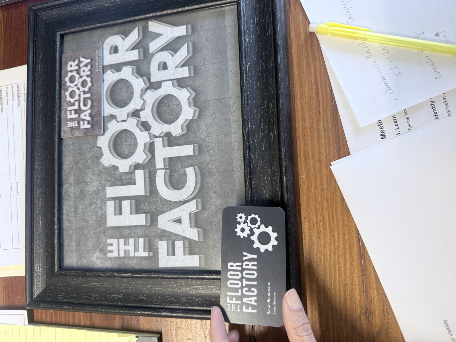 The Floor Factory's original framed logo and business card